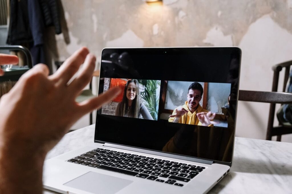 video conference through a webcam on a laptop